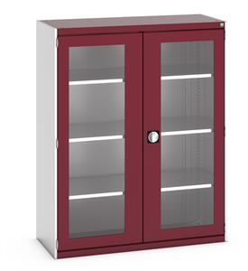 40014057.** Bott Cubio Window Door Cupboard with lockable doors and clear perspex windows. External dimensions are 1300mm wide x 525mm deep x 1600mm high and the cupboard is supplied with 3 x 160kg capacity shelves....